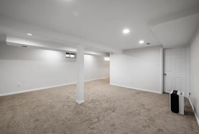 Finished basement family room with new carpet, Twin Cities