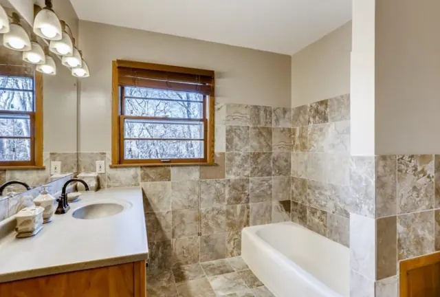 Bathroom with tile wainscot and tile tub surround, Twin Cities