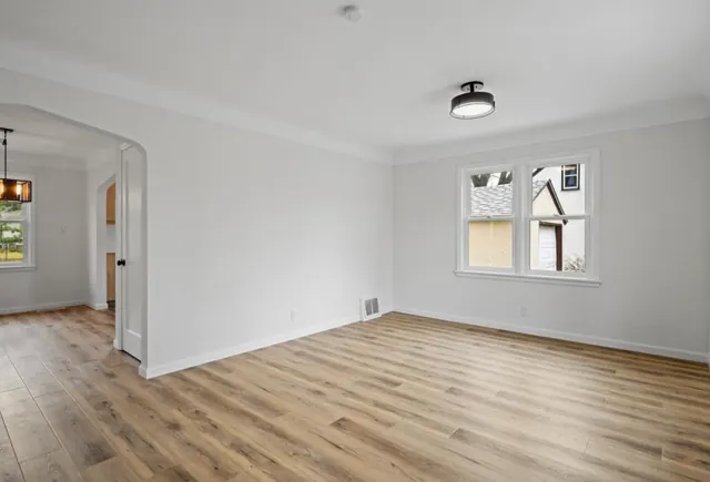 Living and dining rooms with new flooring, paint and light fixtures, Twin Cities